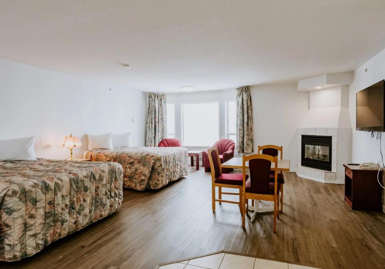 Western Budget Plus Mosaic Suites Penhold Zewnętrze zdjęcie